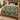 Partridge Pear Tree Christmas woven blanket spread across a bed in a Christmas bedroom