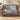 Passionflower Swallowtail Garden woven blanket draped over a sofa in a living room