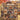Holding a personalized Patchwork Harvest Quilt photo blanket with custom family name