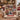 Patchwork quilt look photo collage fleece blanket draped over a cream sofa with a golden retriever