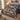 Peaceable Kingdom Starlight Path quilt bedding set with 2 matching pillowcases on a bed with holiday decor