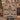 Couple holding a personalized Pennsylvania Dutch Christmas Tree Farm woven blanket with custom family name