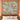 Peony Ribbon Garden woven blanket design shown without a name as a wall tapestry above a bed