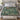 Acanthus Pheasant botanical woven blanket spread across a bed