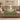 Beech Ruined Cloister woven blanket draped over a sofa or armchair