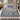 Bluebell Beechwood botanical woven blanket spread across a bed