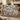Personalized Bluebird Camellia Magnolia Garden Luxe woven blanket styled in a home setting