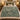 Bramble Fox botanical woven blanket spread across a bed