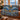 Bull Elk Cataloochee Frost woven blanket draped over a sofa or armchair