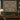 Cardinal Winterberry Holly Thicket botanical woven blanket shown without a name as a wall tapestry