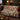Cardinal Winterberry Holly Thicket Luxe woven blanket draped over a sofa or armchair