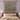 Cardoon Leaf Fan woven blanket draped over a sofa or armchair
