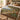 Chestnut Terrace botanical woven blanket spread across a bed