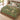 Clover Warren botanical woven blanket spread across a bed
