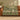 Clover Warren woven blanket draped over a sofa or armchair