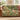 Clover Warren woven blanket draped over a sofa or armchair