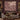 Cyclamen Rootwood botanical woven blanket shown without a name as a wall tapestry