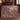Personalized Cyclamen Rootwood woven blanket styled in a home setting