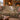 Dusty Rose Woodland Carpet woven blanket draped over a sofa or armchair