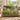 Fern and Meadowsweet woven blanket draped over a sofa or armchair
