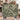 Couple holding the personalized Fern Bower woven blanket