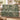 Fern Bower woven blanket draped over a sofa or armchair