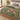 Fritillary Mosaic Meadow botanical woven blanket spread across a bed