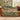 Fritillary Mosaic Meadow woven blanket draped over a sofa or armchair
