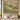Fritillary Mosaic Meadow botanical woven blanket shown without a name as a wall tapestry