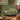 Frog Lily Pool woven blanket draped over a sofa or armchair