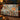 Frost Orangery Glasshouse woven blanket draped over a sofa or armchair