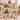 Woman holding a personalized Grinch Merry Mischief Christmas fleece blanket with a custom name