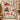 Personalized Grinch Merry Mischief Christmas fleece blanket displayed on a wall
