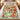 Personalized Grinch Ornament Workshop Christmas fleece blanket spread on a bed
