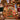 Rhinestone-style christmas tree Christmas fleece throw with custom name draped over a cream sofa