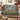 Hare Meadow woven blanket draped over a sofa or armchair