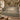 Hare Meadow woven blanket draped over a sofa or armchair