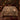 Hedgehog Cep Wood botanical woven blanket spread across a bed