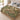 Hellebore Courtyard botanical woven blanket spread across a bed