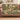 Hellebore Courtyard woven blanket draped over a sofa or armchair