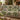 Herb Ninepatch Garden woven blanket draped over a sofa or armchair