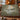Heron Mill Pond woven blanket draped over a sofa or armchair