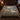 Holly Lodge botanical woven blanket spread across a bed