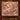 Personalized Hollyhock Court woven blanket styled in a home setting