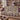 Lavender Flying Geese woven blanket draped over a sofa or armchair
