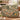 Limonaia Cypress woven blanket draped over a sofa or armchair