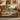 Limonaia Cypress woven blanket draped over a sofa or armchair