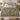 Linden Doves botanical woven blanket spread across a bed