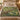 Linden Doves botanical woven blanket spread across a bed