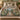 Magnolia Rain botanical woven blanket spread across a bed